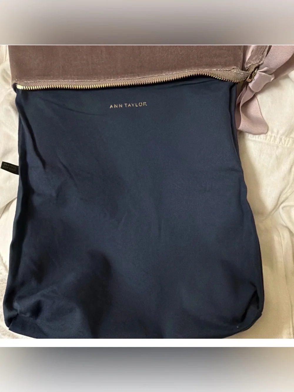 Ann Taylor Velvet Zippered Folding Clutch purse with a large ribbon bow /Lavande
